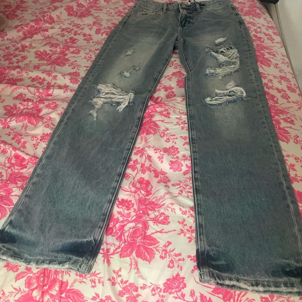 Distressed Blue Jeans